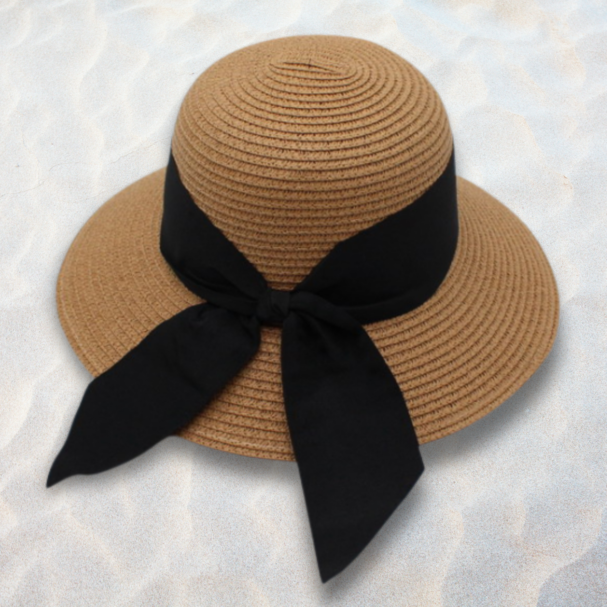 Brown straw hat with a black ribbon on a light gray background