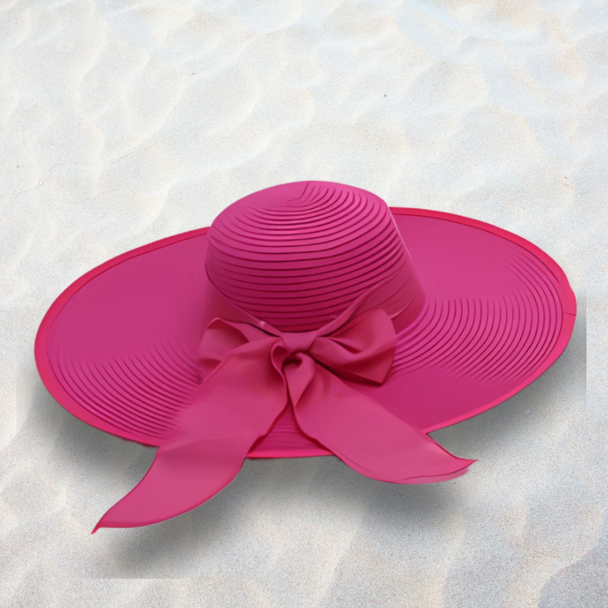 Pink sun hat with a wide brim and bow on a textured white background