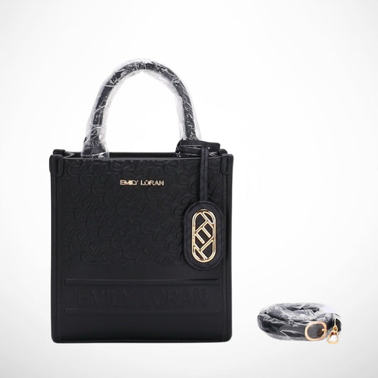 Black handbag with gold emblem and clear plastic wrap on a white background