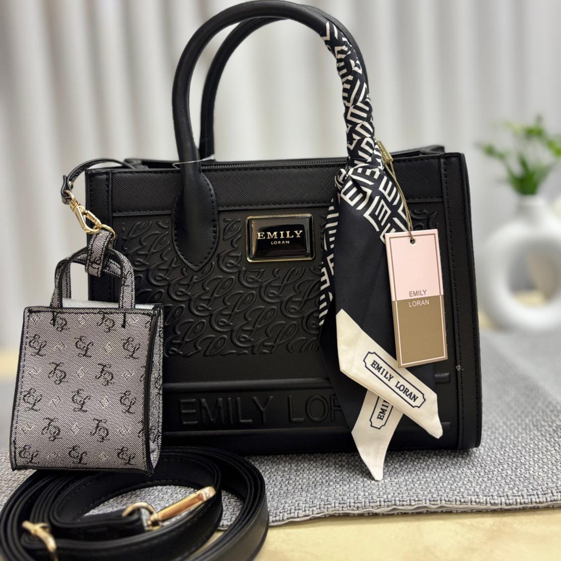 Black handbag with matching accessories and 'EMILY LORAN' branding from InStyle Fashion HK