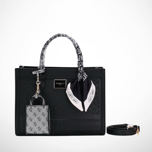 Black handbag with decorative elements and matching pouch on a white background from InStyle Fashion HK