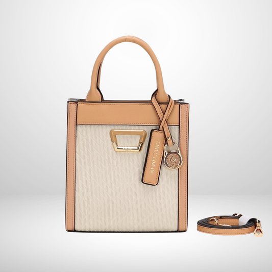 Tan and beige handbag with matching strap on a light gray background