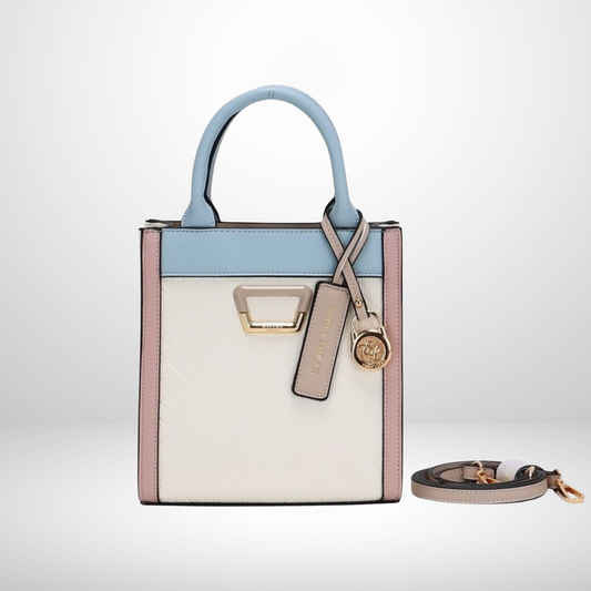 Two-tone handbag with a matching strap on a light gray background