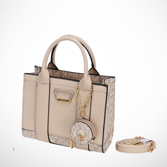 Beige handbag with matching keychain and strap on a white background