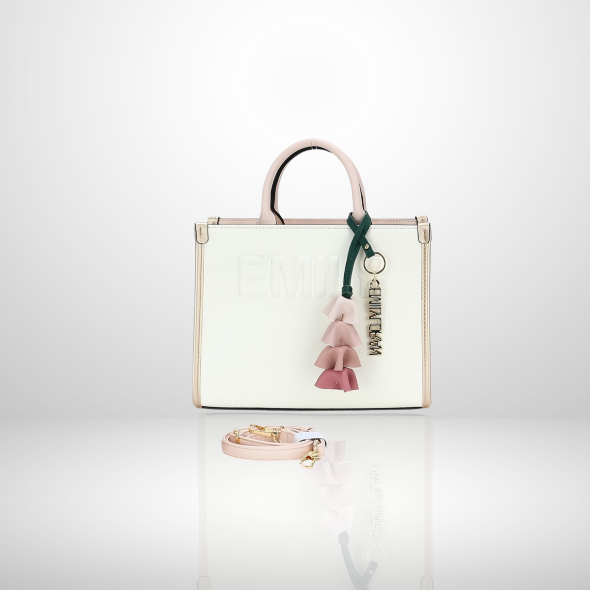 Elegant women's structured tote bag with embossed front logo, floral tassel keychain charm, top handles, and detachable shoulder strap, available in pink.