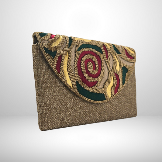 Textured clutch bag with floral embroidery on a light gray background