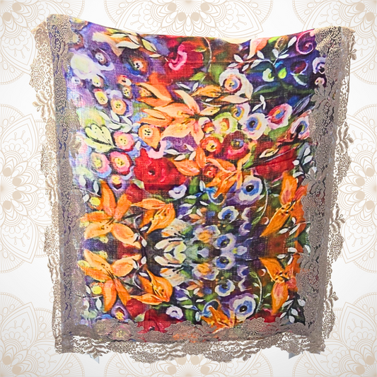 Colorful floral patterned fabric on a textured white background