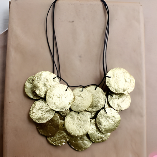 Handmade from recycled paper and leather & finished with a special waterproof applique, this head-turning statement piece is exclusively from InStyle Fashion HK.