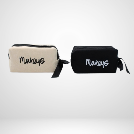 Stylish smart cosmetic bag with tonal zipper and wrist strap. Compact, travel‑friendly design keeps essentials secure. Available in beige and black.