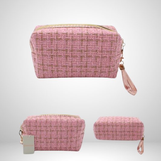 Refined tweed cosmetic bag with a luxe gold zipper and wrist strap. Compact for travel or daily use, keeping makeup secure.