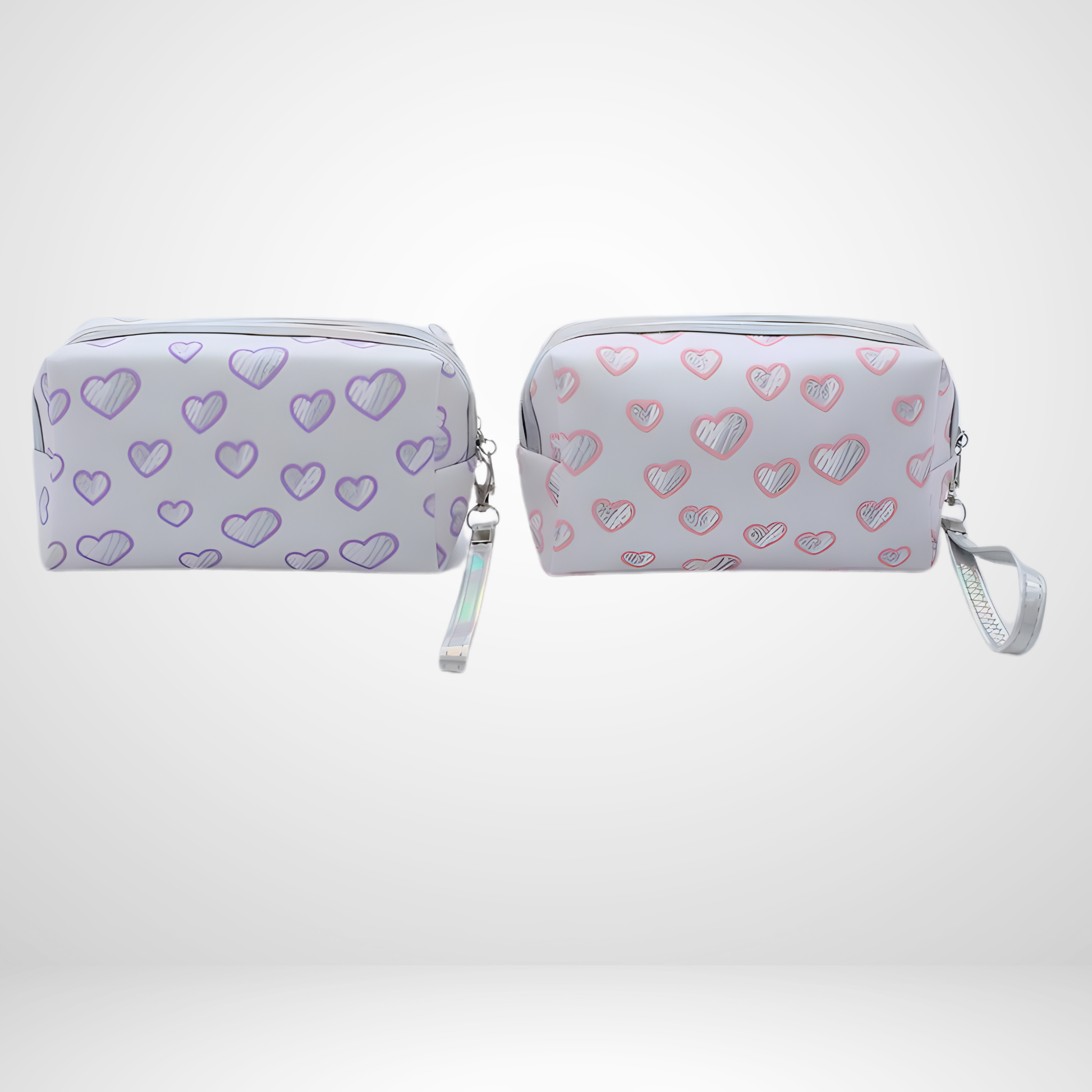 Two small pouches with heart patterns on a white background