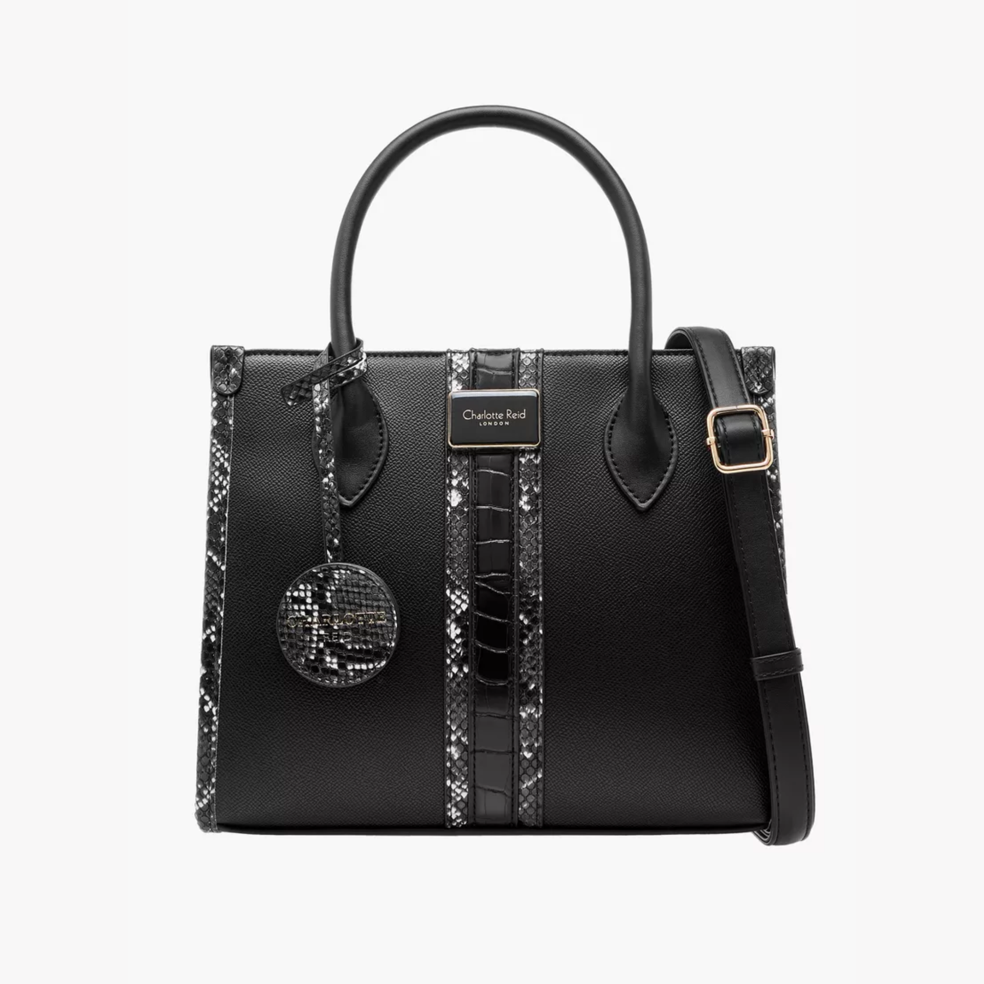 Discover our premium black tote handbag with a sleek structured design, detachable strap, and chic charm—perfect for work, travel, or everyday elegance.
