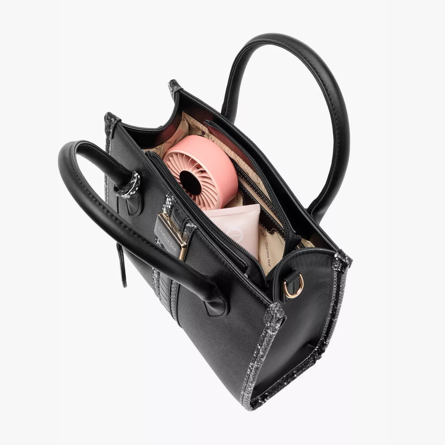 Discover our premium black tote handbag with a sleek structured design, detachable strap, and chic charm—perfect for work, travel, or everyday elegance.