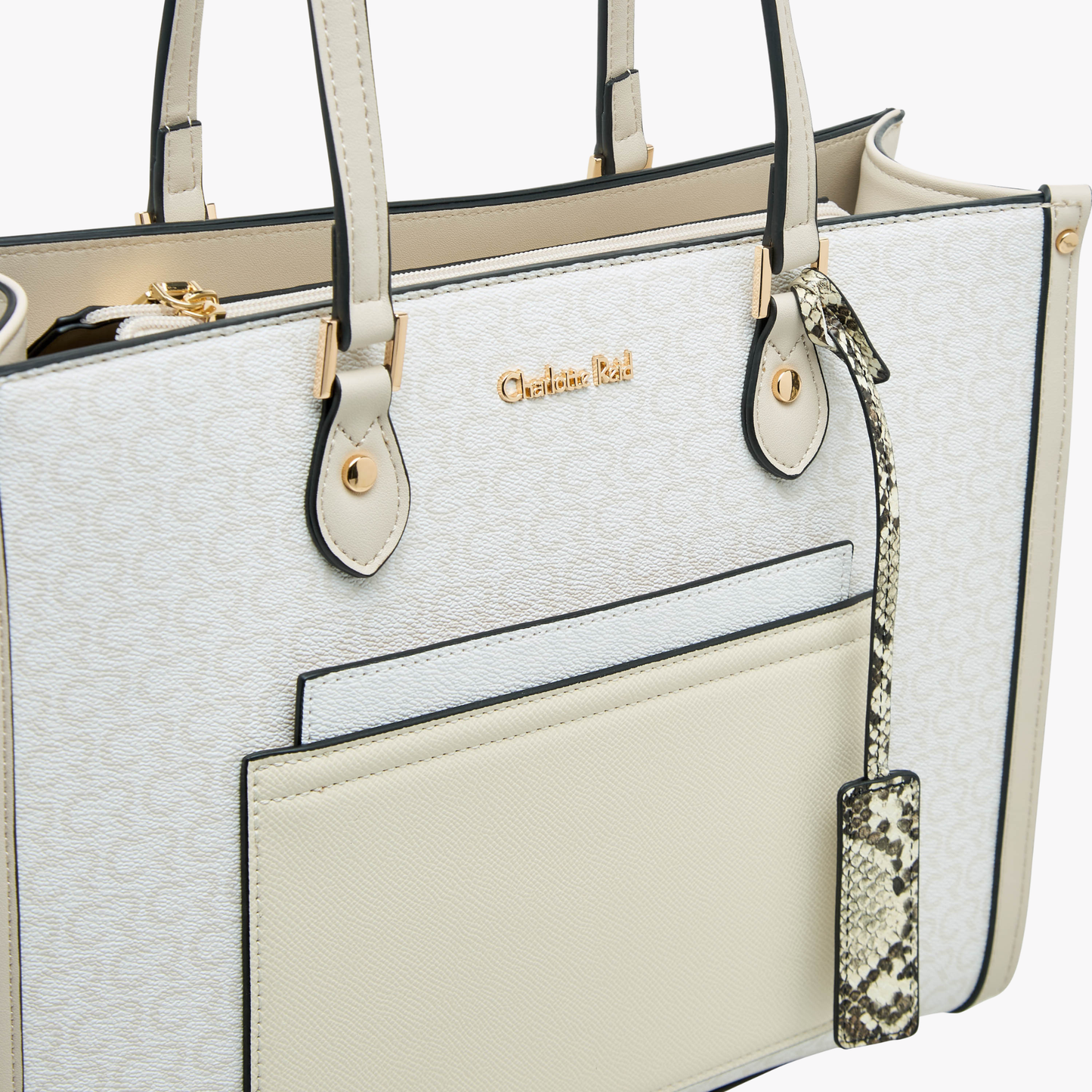 Charlotte Reid elegant beige shoulder handbag with outer pocket, gold branding & spacious design for modern women.