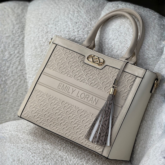 Off White Smart bag with embossed monogram, textured panels, dual handles & strap, fits A4/laptop for work. Stylish, spacious, hands-free ease, from InStyle Fashion HK.