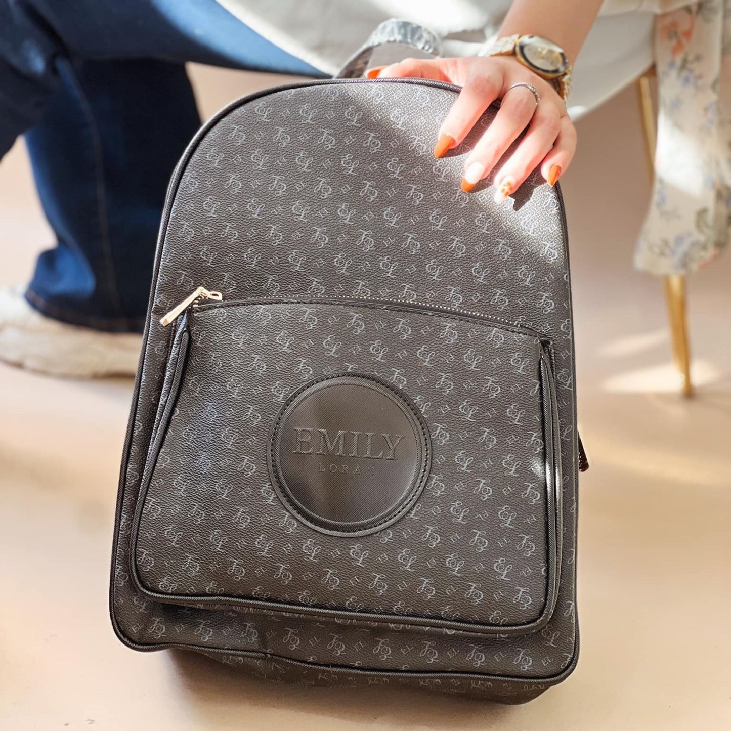 Black Backpack with Zipped Pocket & Monogram Detail