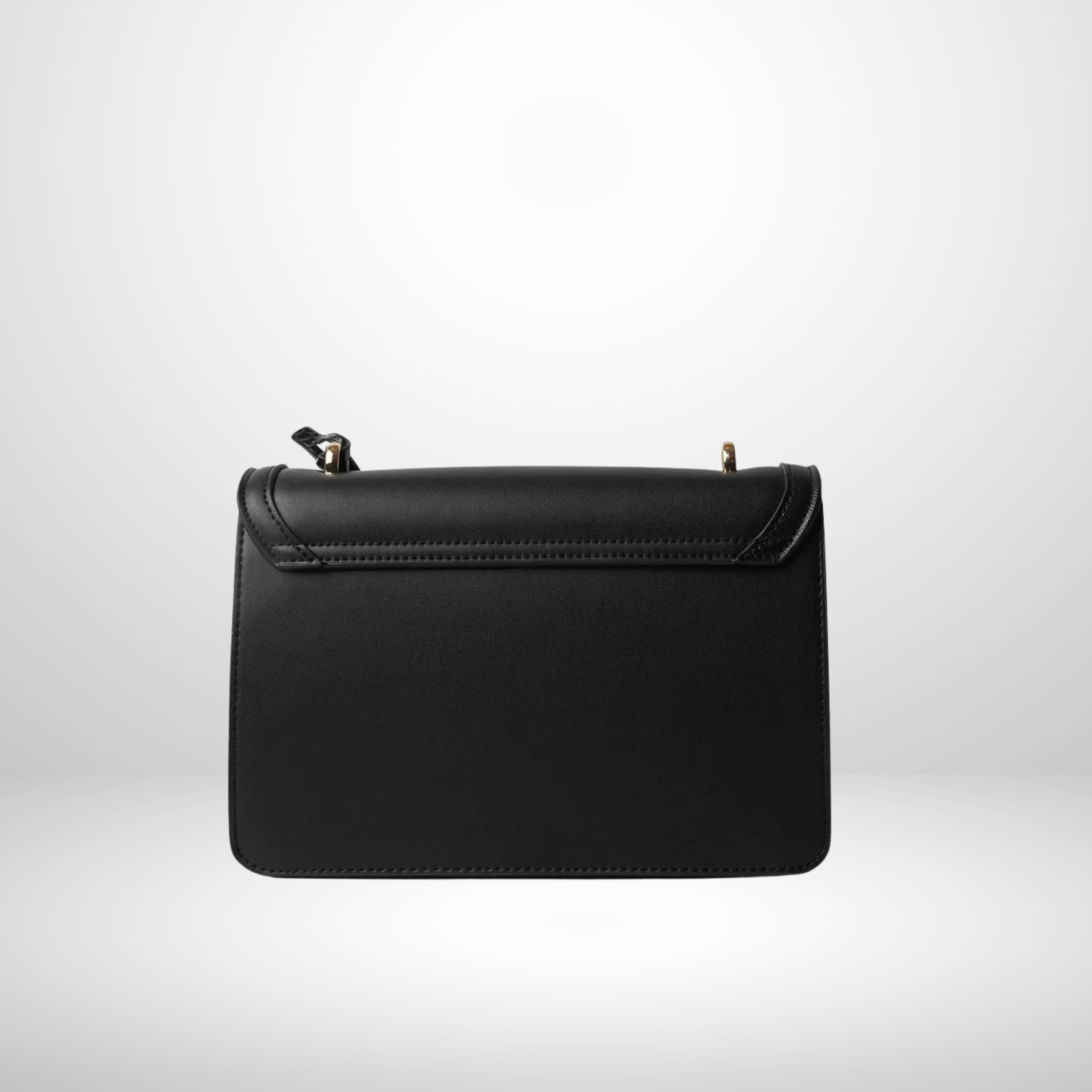 Black embossed handbag with additional strap on a white background