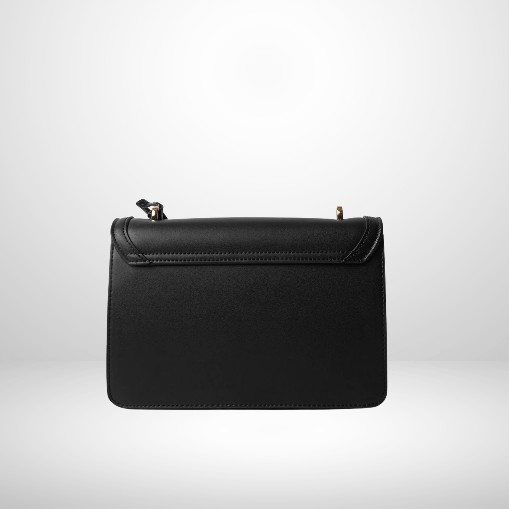 Black embossed handbag with additional strap on a white background