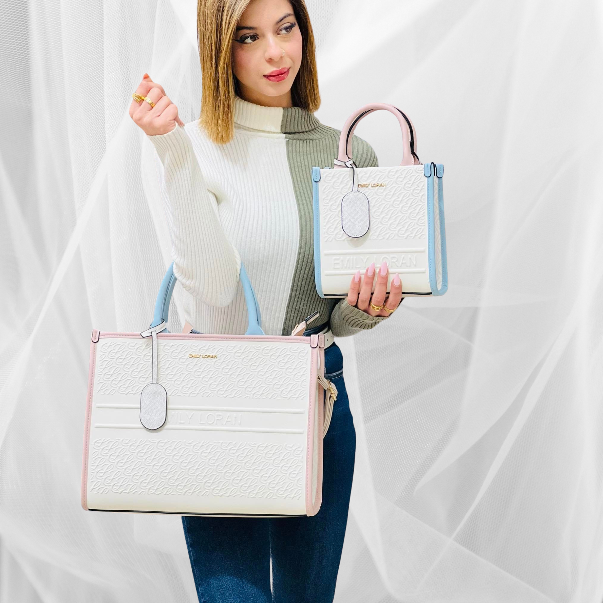 Woman holding two white handbags with blue handles against a white background