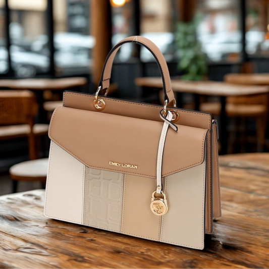 Satchel bag featuring a dual compartment with flaps and magnetic closure, top grab handle,  additional long removable strap.