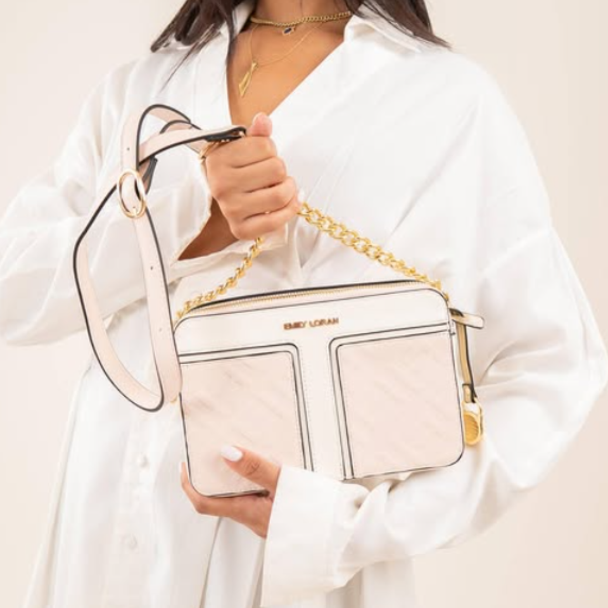 Pink Monogram Embossed Camera Crossbody Bag