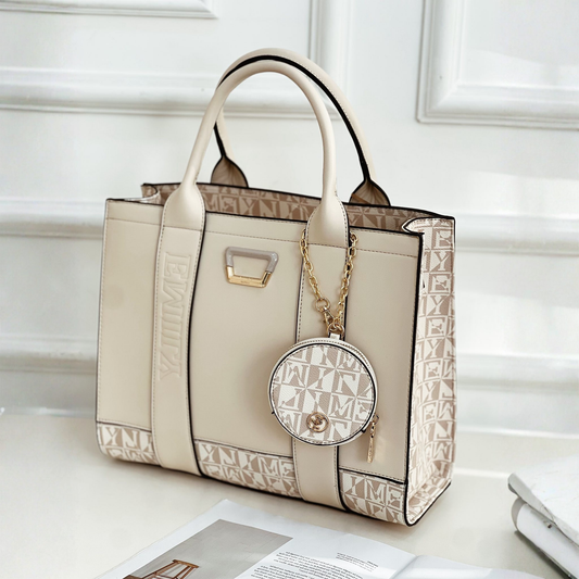 Chic beige tote with monogram gusset, double handles, zipped purse & adjustable strap—style meets function for everyday charm and hands-free ease.