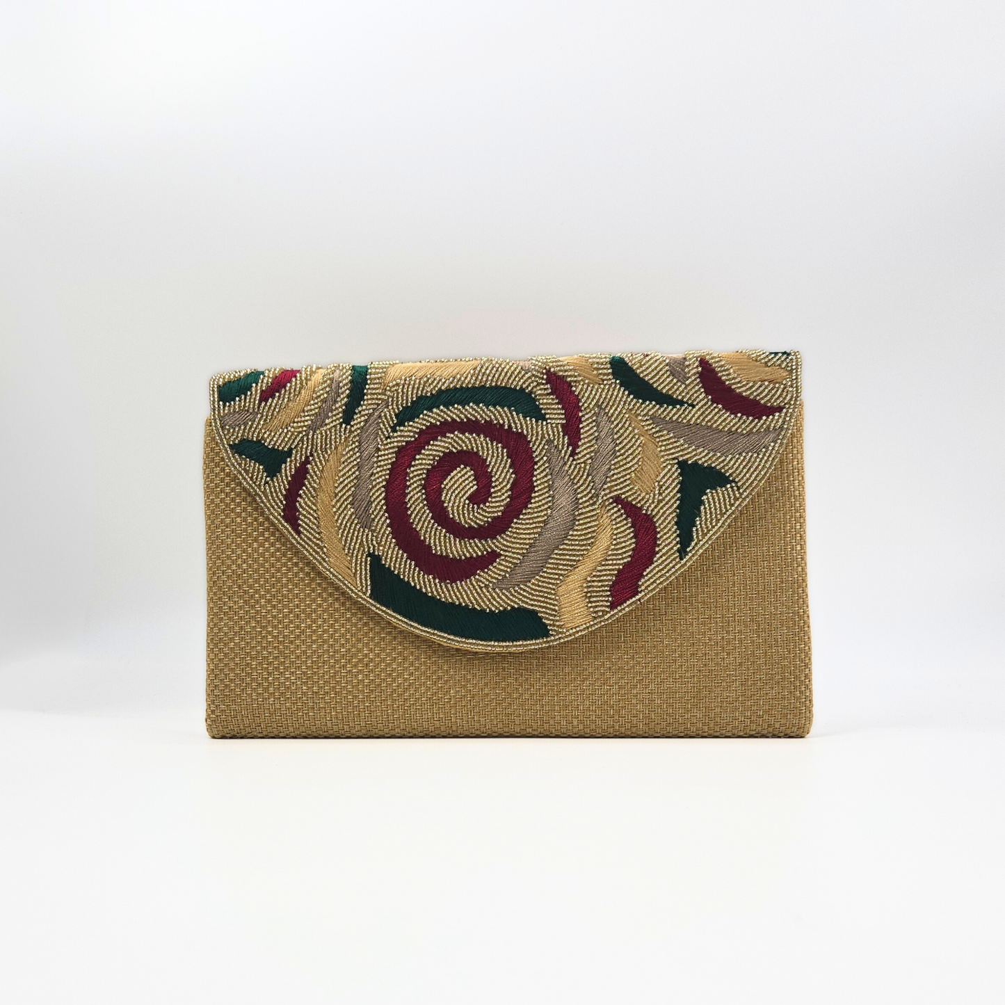 Beaded clutch with floral design on a white background