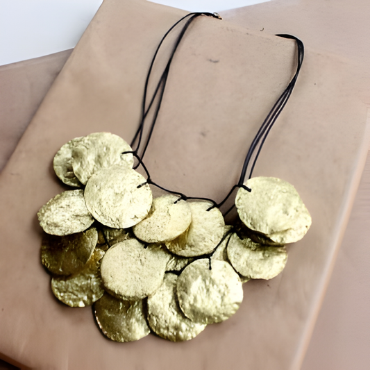 Handmade from recycled paper and leather & finished with a special waterproof applique, this head-turning statement piece is exclusively from InStyle Fashion HK.